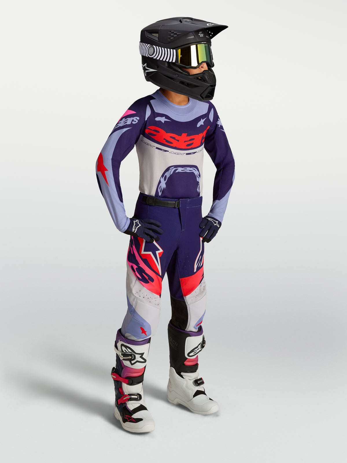 Alpinestars 2027 Youth Supertech Dyna Jersey and Gear Set, purple and pink ventilated race-fit motocross kit for young riders.