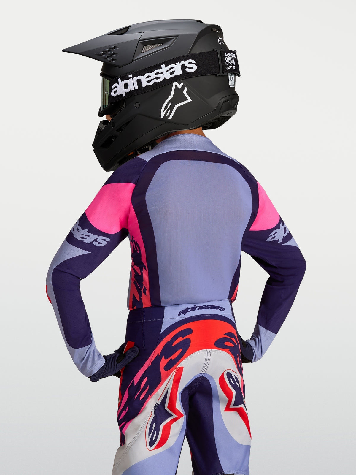 Alpinestars 2027 Youth Supertech Dyna Jersey, purple and pink motocross jersey with stretch mesh, back view on-model.