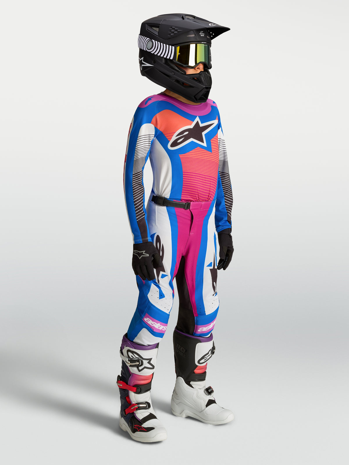 Ensemble Alpinestars Supertech Maven junior 2027, maillot et pantalon de motocross bleu et corail vif en maille extensible