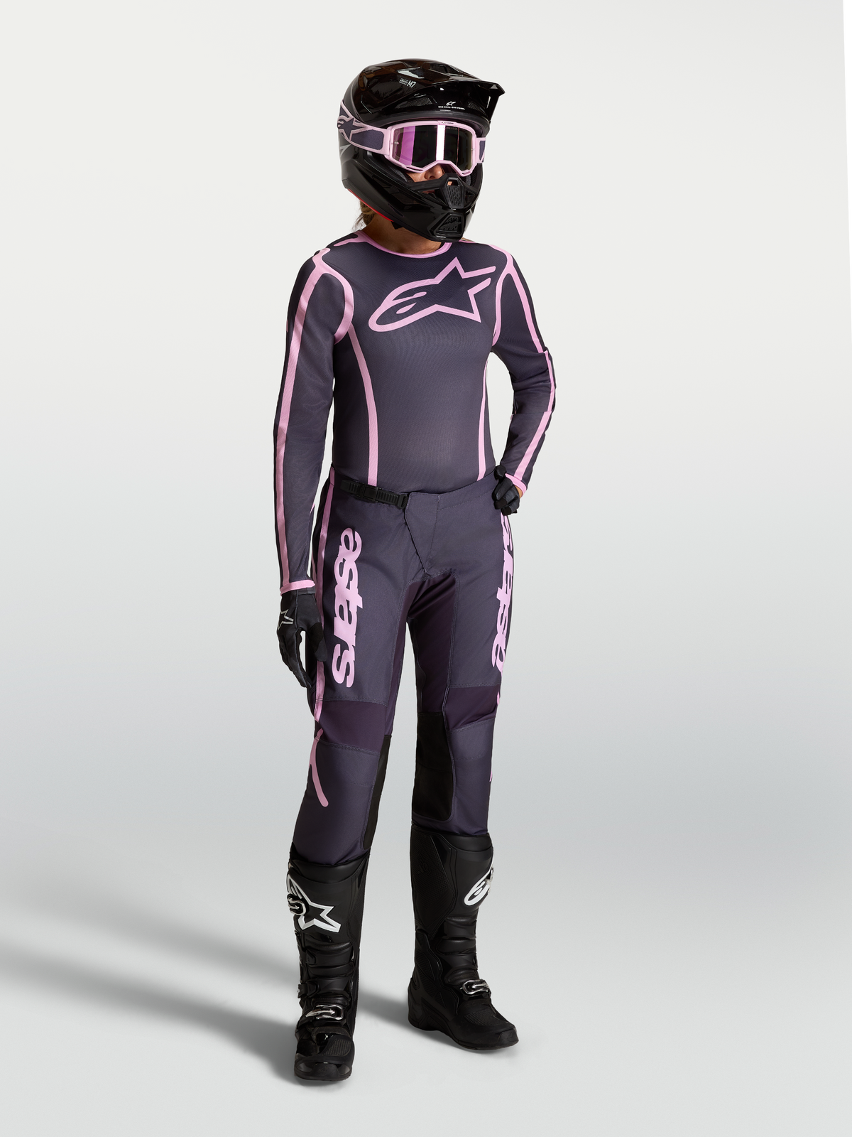 Alpinestars Stella Fluid Apex V2, maillot et pantalons de motocross femme, gris et rose, tenue tout-terrain performante.