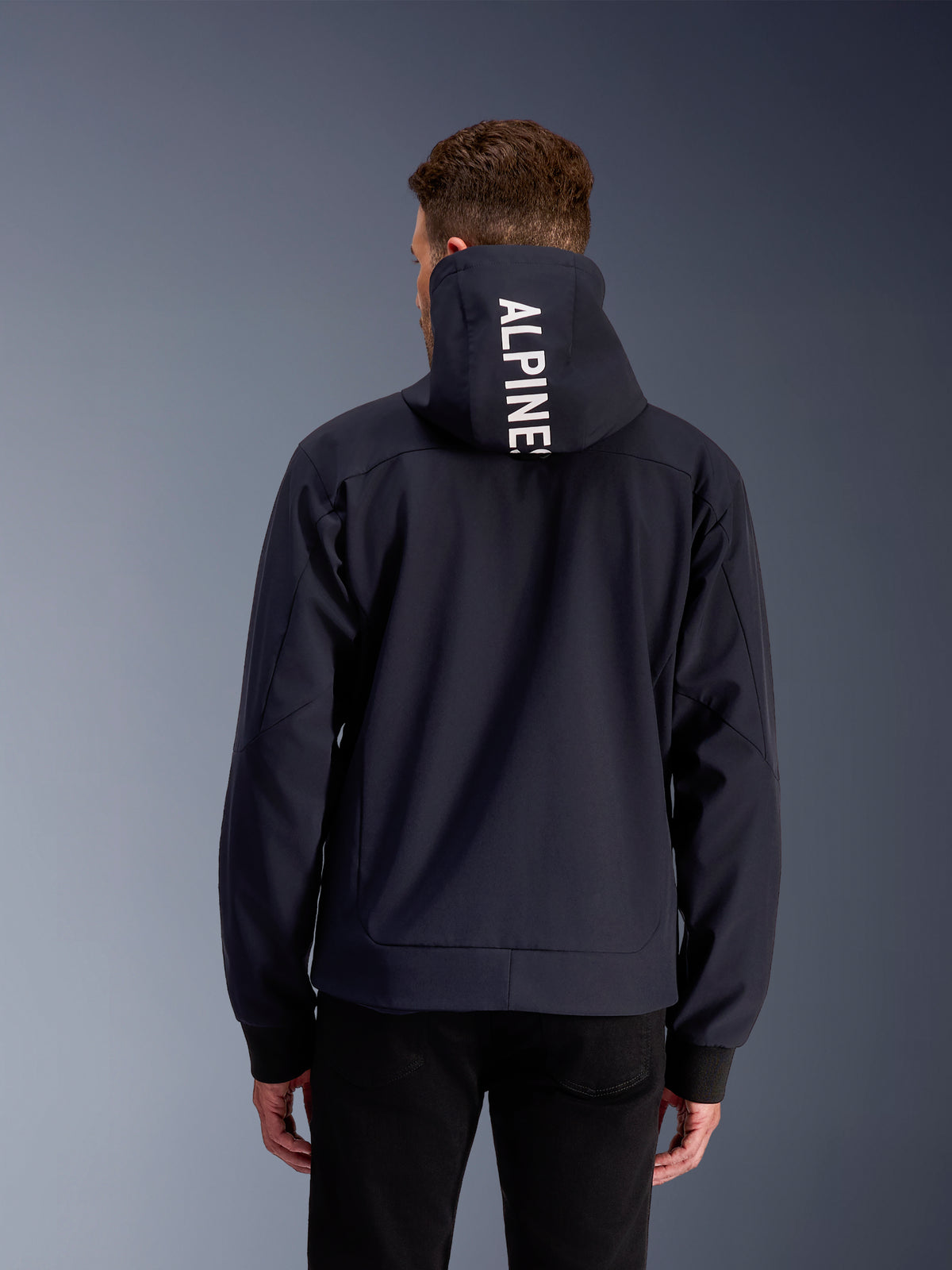 Alpinestars Radium Tech Hoodie, Men's Urban Motorcycle Jacket, Black and White, 3L textile, back view with hood logo.