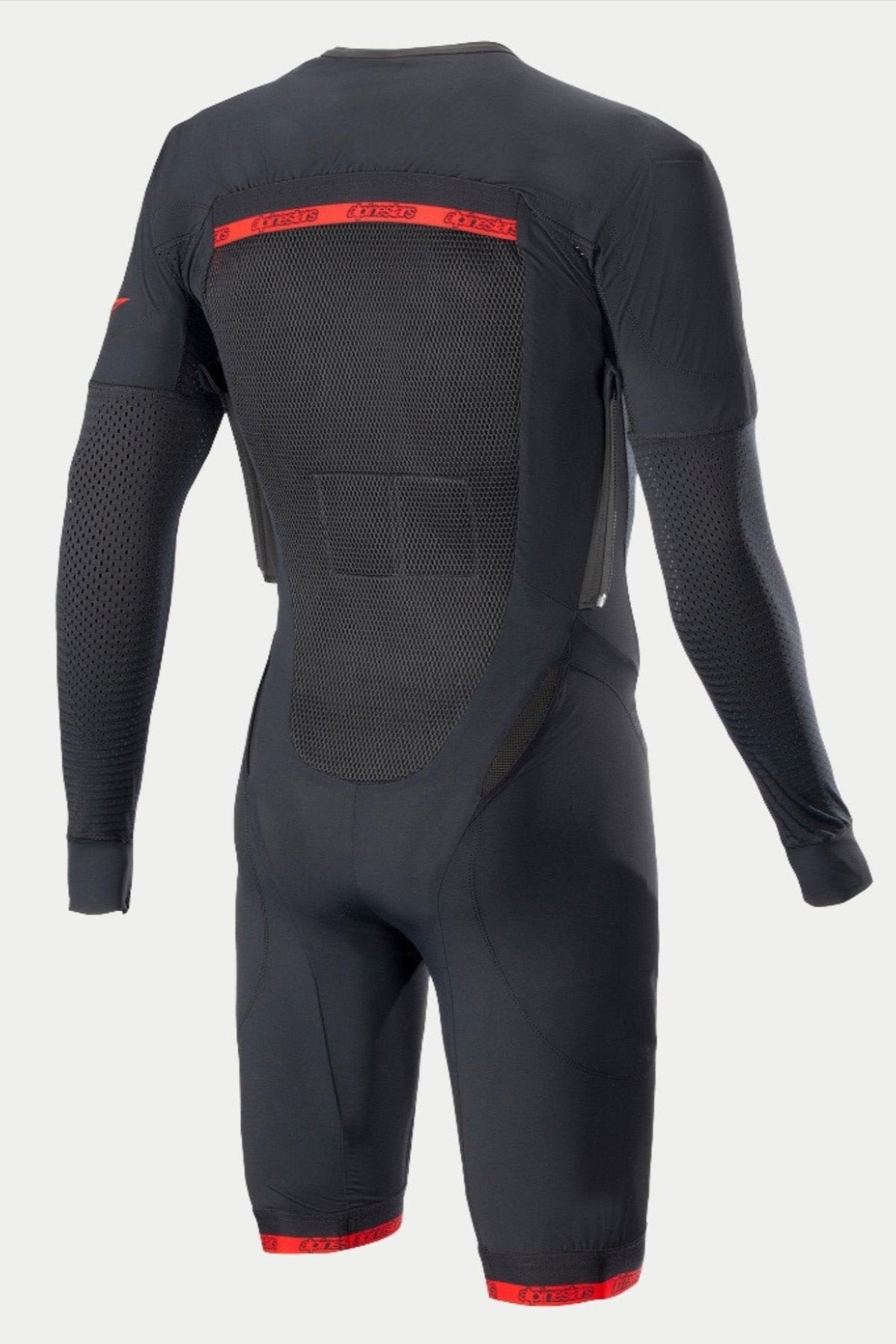 Sous-couche technique du système Tech-Air®, sous-combinaison de moto racing noire et rouge, maille ventilée au dos, portée par un mannequin.