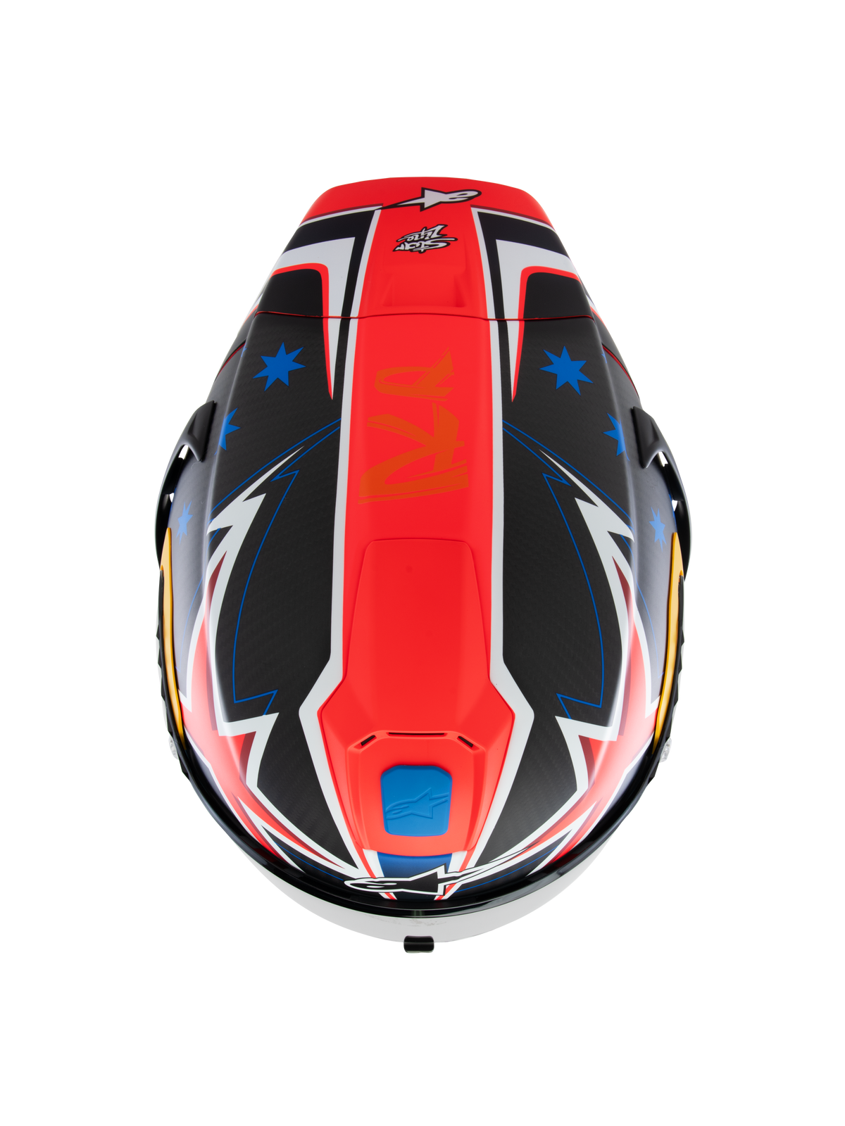 Casque Alpinestars Supertech R10 Miller Limited Edition, vue de dessus, graphique Carbon Red Matt avec bande rouge centrale, étoiles bleues sur sections en fibre de carbone noire, détails blancs et bleus style éclair, design aérodynamique pour la performance sur piste.