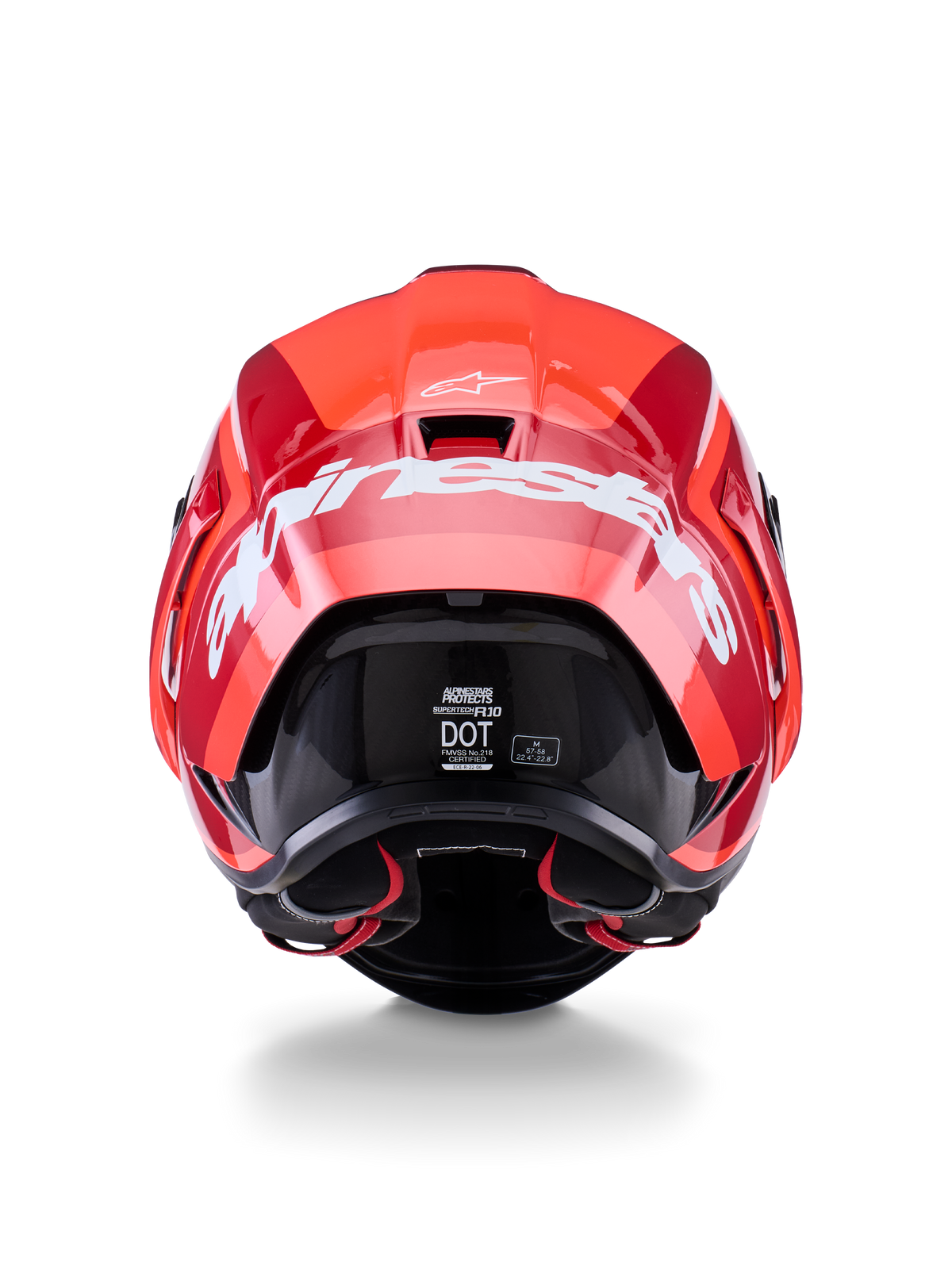 Casque Alpinestars Supertech R10 Arius, vue arrière, design rouge brillant et rouge foncé, grand logo Alpinestars blanc à l'arrière, étiquettes de certification DOT et ECE visibles, casque de course aérodynamique haute performance