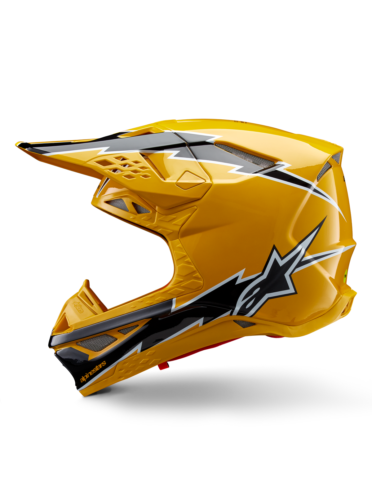 Casque Alpinestars Supertech M10 Ampress, casque de motocross, jaune brillant avec graphismes noirs et blancs, vue latérale avec motifs angulaires audacieux, logo étoile Alpinestars et multiples ports de ventilation avec maille argentée, équipement de course tout-terrain professionnel