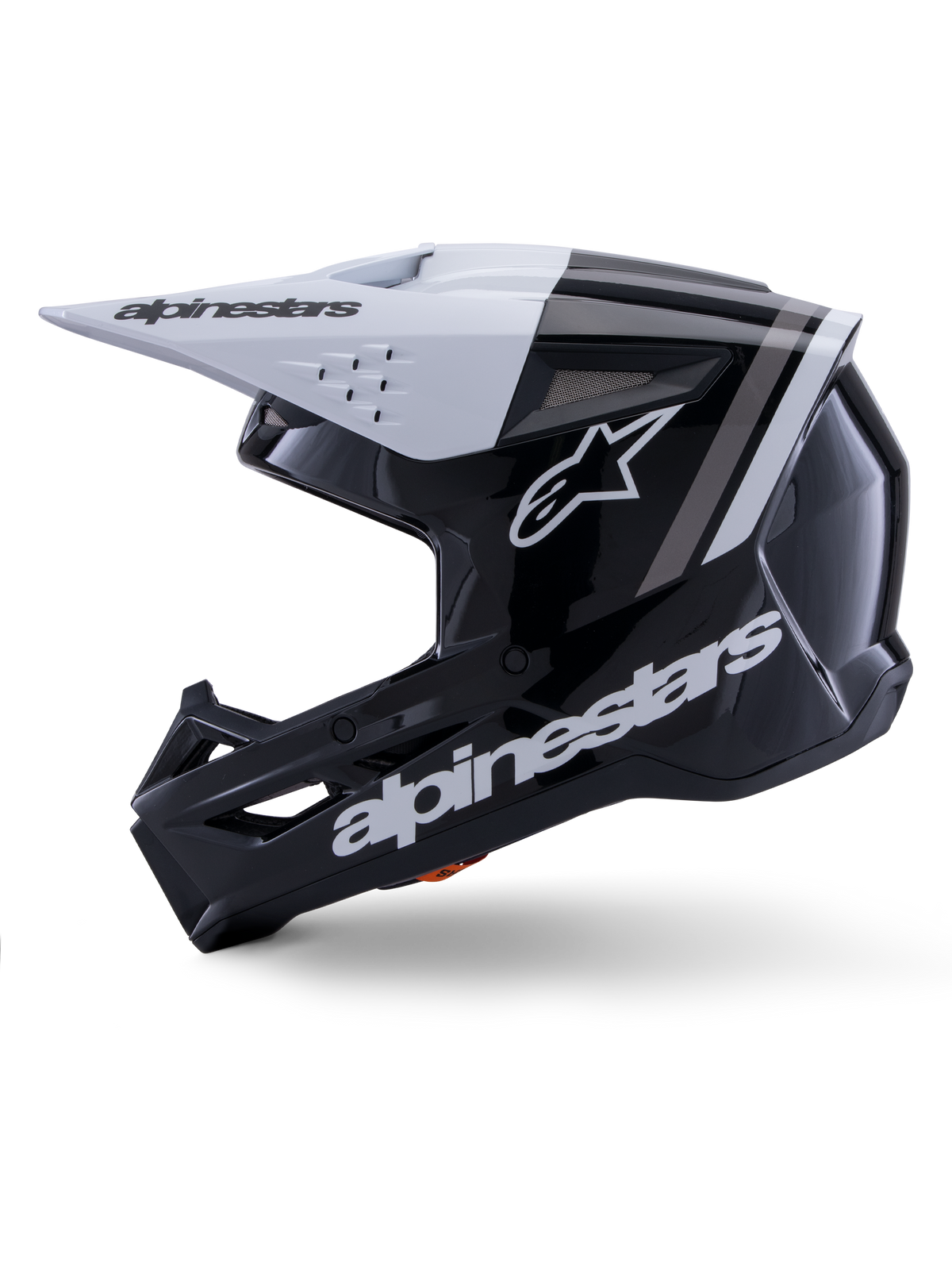 Casque Alpinestars S-M3 Radium ECE 22.06, vue de profil, finition noir et blanc brillant, bandes de course grises, logo Alpinestars blanc sur le côté et la mentonnière, design ventilé pour le motocross et l'enduro