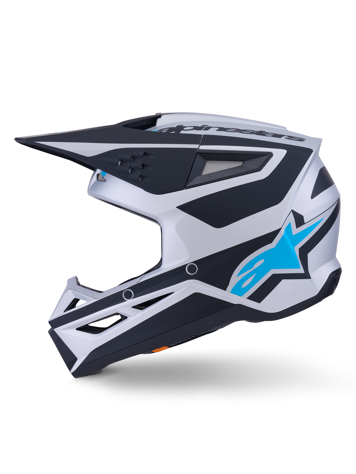 Casque Alpinestars S-M3 Heat ECE 22.06, casque de motocross, finition mate argent, bleu et noir, vue de profil, présentant un logo étoile Alpinestars bleu vif, une visière noire et de multiples orifices de ventilation, design aérodynamique agressif pour la course tout-terrain