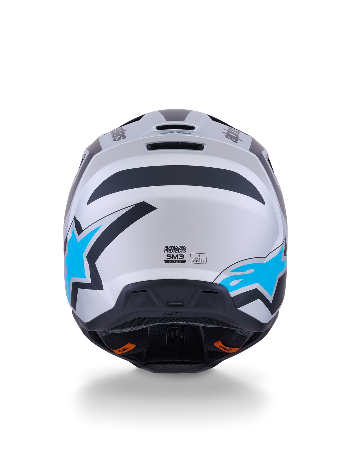 Alpinestars S-M3 Heat Helmet, casque de motocross, argent, bleu et noir mat, vue arrière montrant des logos d'étoiles bleu vif, finition mate et ports de ventilation intégrés.