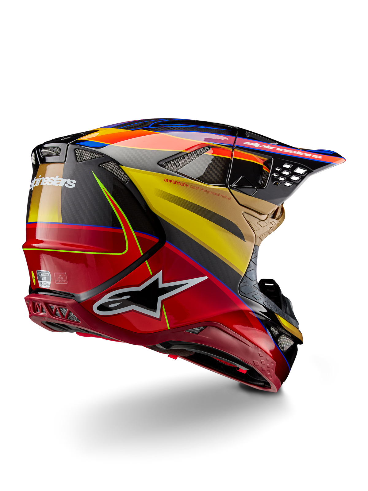Casque Alpinestars Supertech M10 Era, casque de motocross, Gold Yellow Rio Red Glossy, vue de trois-quarts arrière montrant la coque en fibre de carbone avec des graphismes rouges et jaunes, des touches de bleu, un profil aérodynamique avec de multiples ports de ventilation et le logo Astar bien visible.