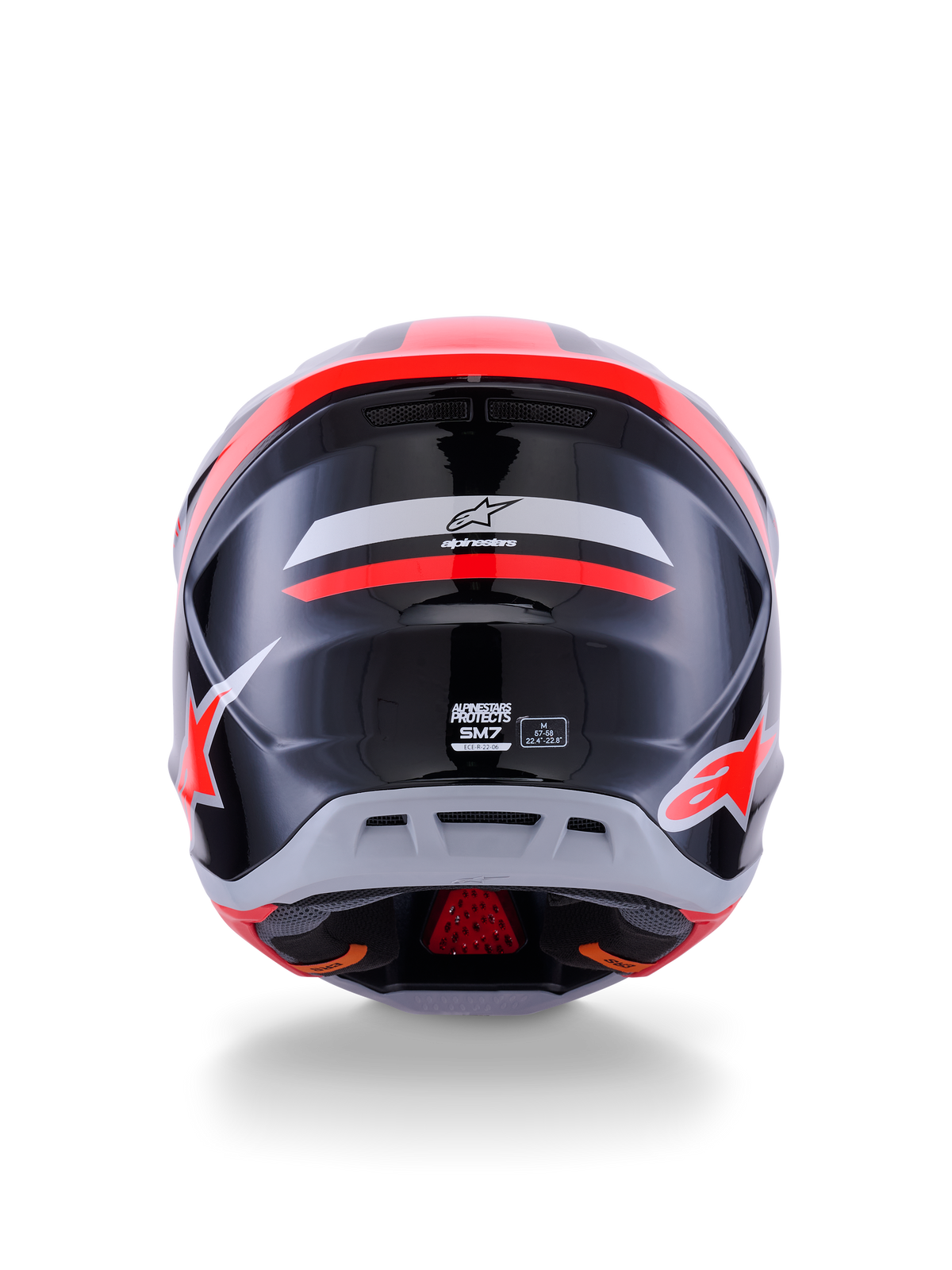 Casque Alpinestars S-M7 Rise ECE 22.06, casque de motocross, vue arrière, noir, argent et rouge fluo brillant, avec le logo Alpinestars et le marquage S-M7, finition brillante avec coque aérodynamique et détails de ventilation
