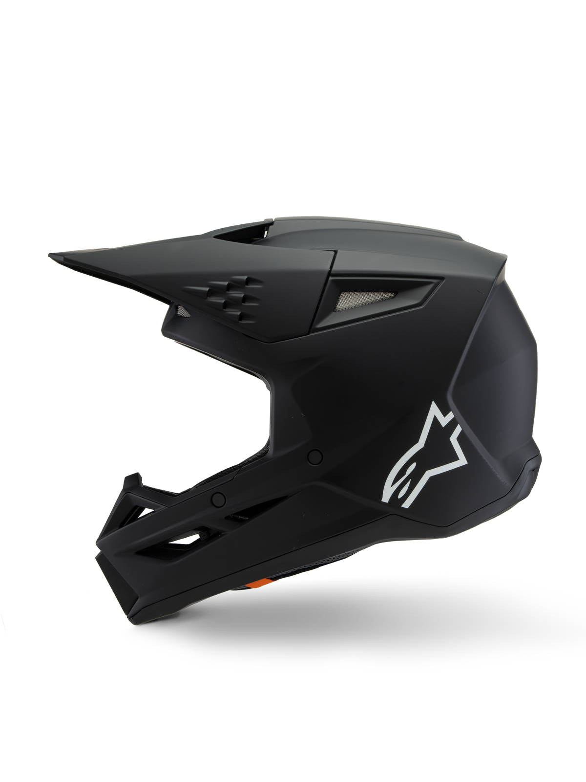 Casque Alpinestars S-M3 Youth Solid ECE 22.06, casque de motocross, noir mat, vue de profil avec logo Alpinestars blanc, coque aérodynamique avec aérations en maille et visière intégrée, protection de tête pour enfant pour la course tout-terrain