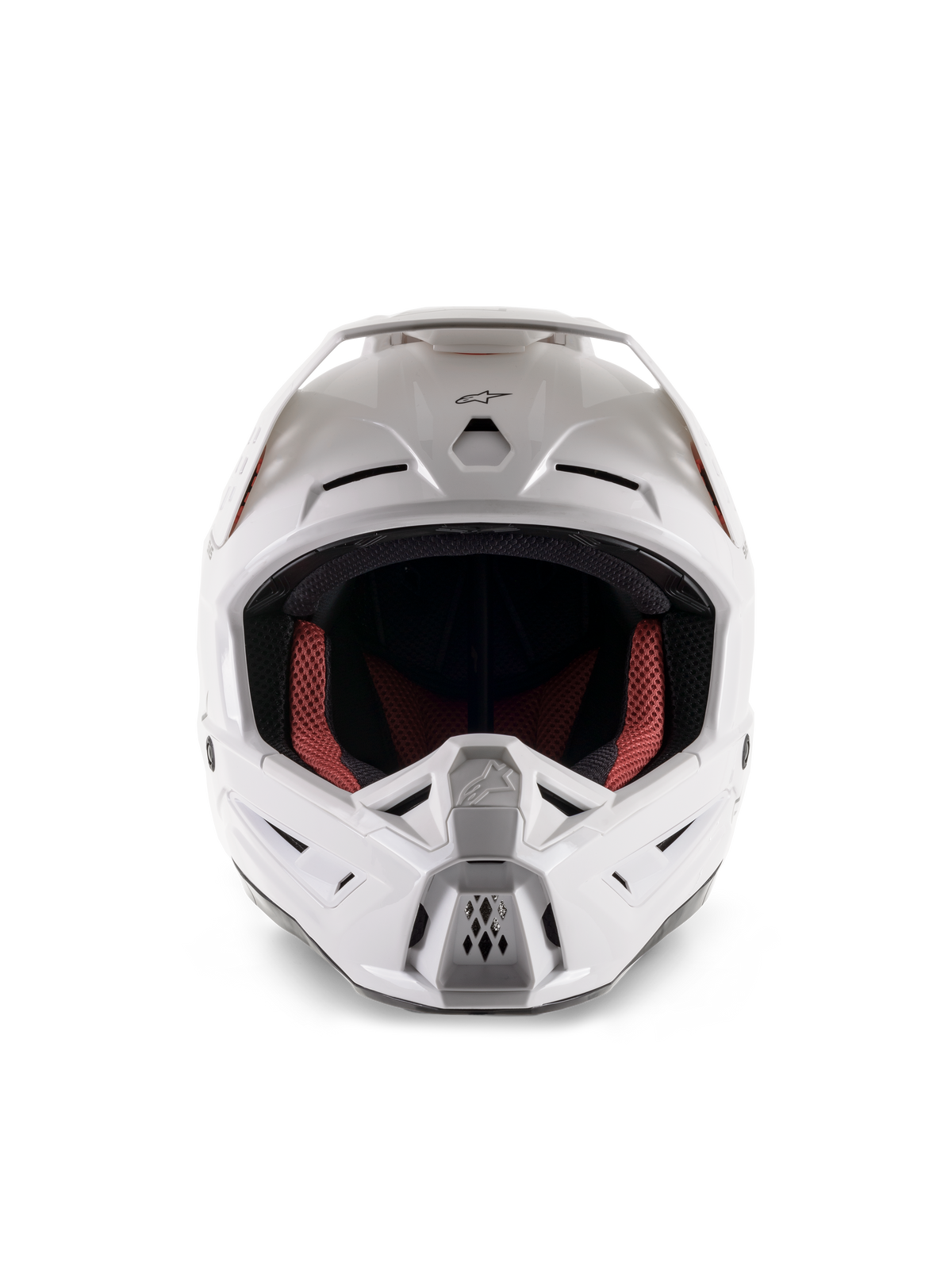 Casque Alpinestars S-M5 Solid ECE 22.06, casque de motocross, blanc brillant, vue de face, doté de multiples entrées d'air sur la mentonnière et le front, large visière, doublure intérieure rouge et noire, design profilé et aérodynamique pour la course tout-terrain