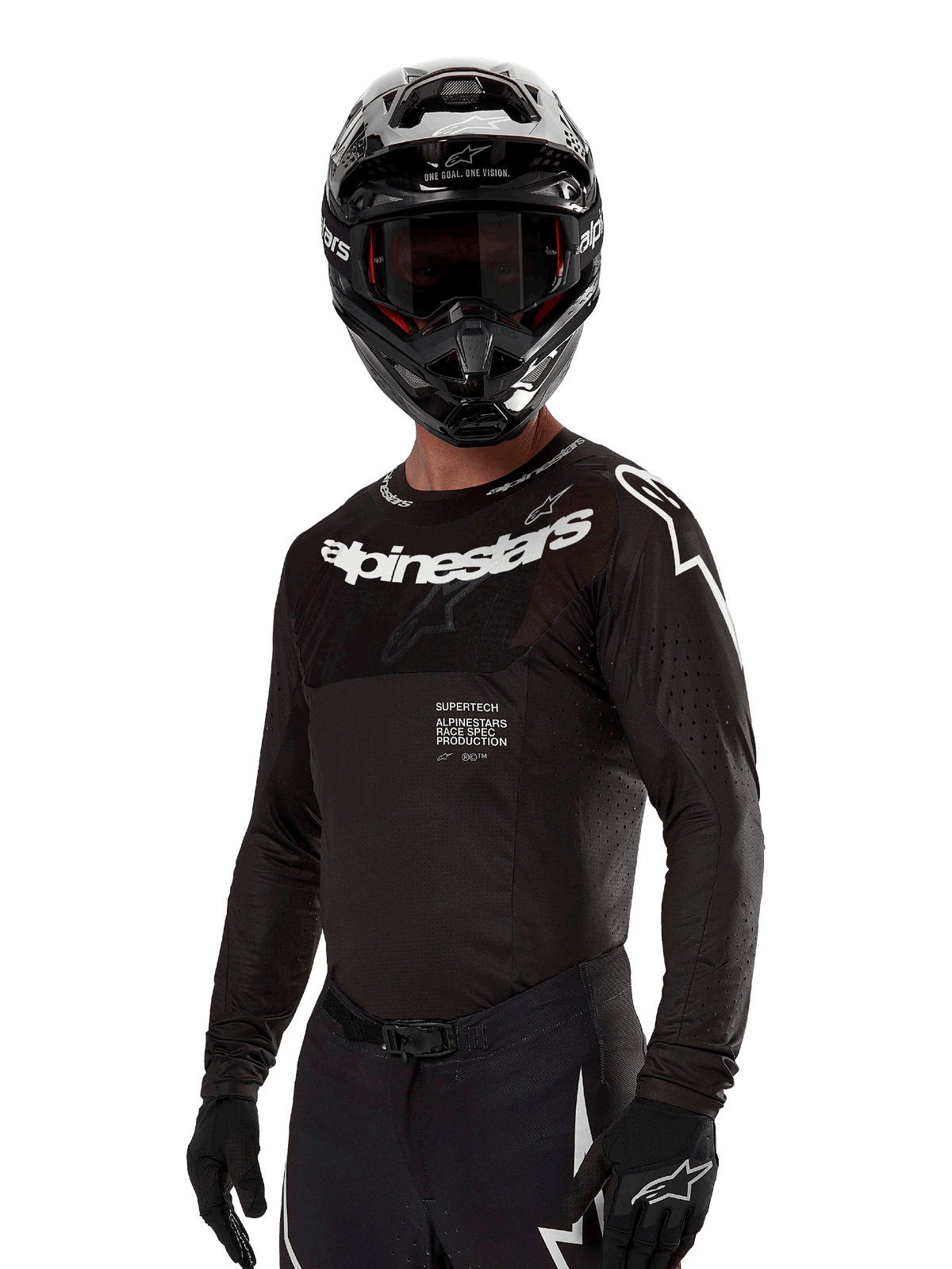 Alpinestars 2024 Supertech Ward Jersey, Motocross Jersey, Black and White, long-sleeve performance gear with bold Alpinestars branding, worn with matching helmet and gloves, athletic fit for off-road riding