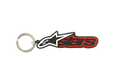 Porte-clés Alpinestars Blaze, porte-clés en caoutchouc 3D noir et rouge, arborant le logo étoile blanc et noir et un texte aux contours rouges, anneau métallique robuste, accessoire inspiré des sports mécaniques
