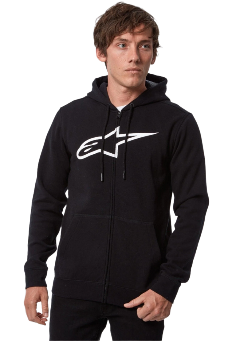 Alpinestars Ageless Zip V3 Hoodie, male model wearing black full-zip fleece sweatshirt, white Alpinestars chest logo, drawstring hood, ribbed cuffs and hem, casual motorsport-inspired streetwear