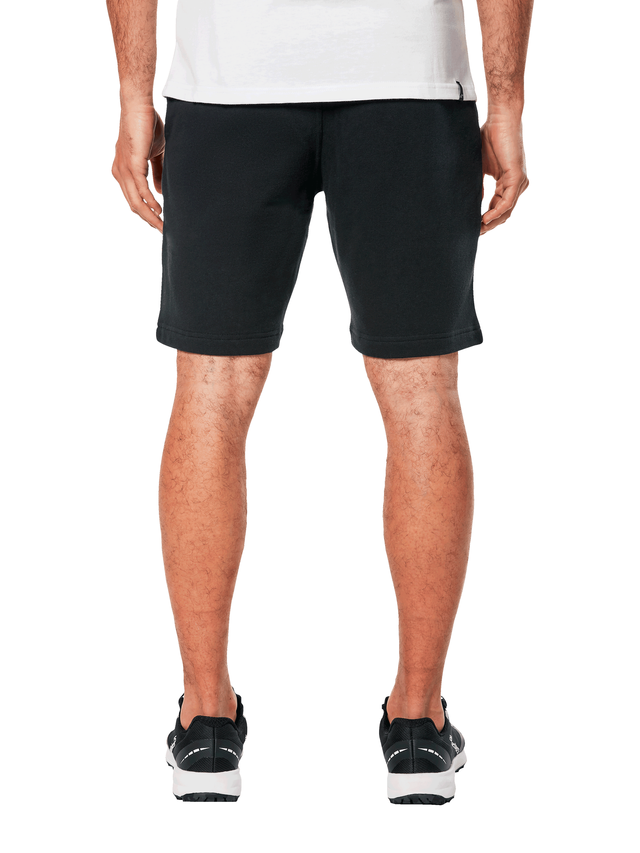 Alpinestars Dunker Short, short d'entraînement en polaire noir pour homme, vue arrière, design décontracté avec taille élastique, porté avec des baskets noires