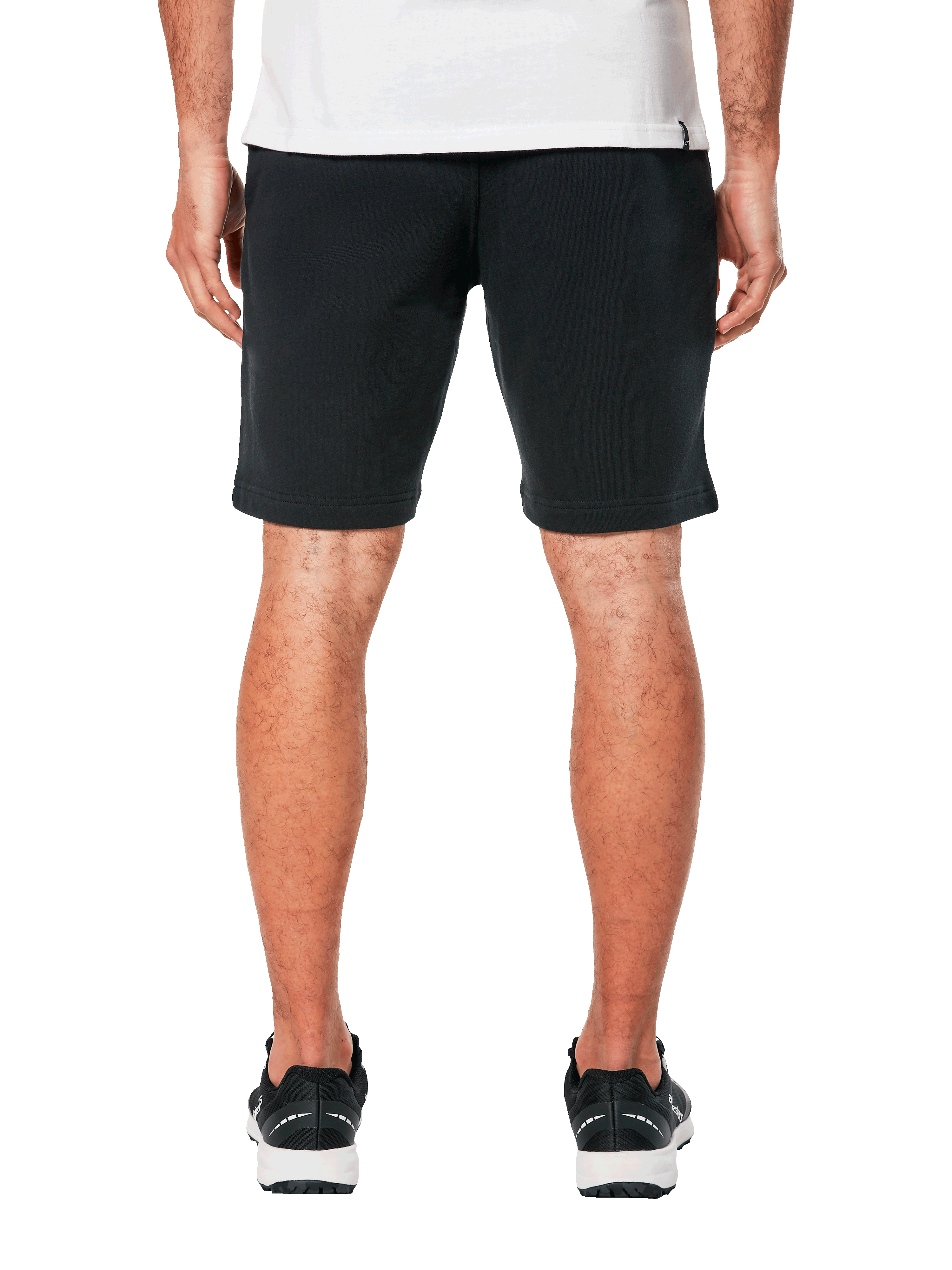 Alpinestars Dunker Short, short d'entraînement en polaire noir pour homme, vue arrière, design décontracté avec taille élastique, porté avec des baskets noires