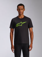 T-shirt Alpinestars Ageless 2.0 CSF, t-shirt à manches courtes, noir avec graphique de casque Alpinestars MX vert citron, streetwear décontracté de sport automobile