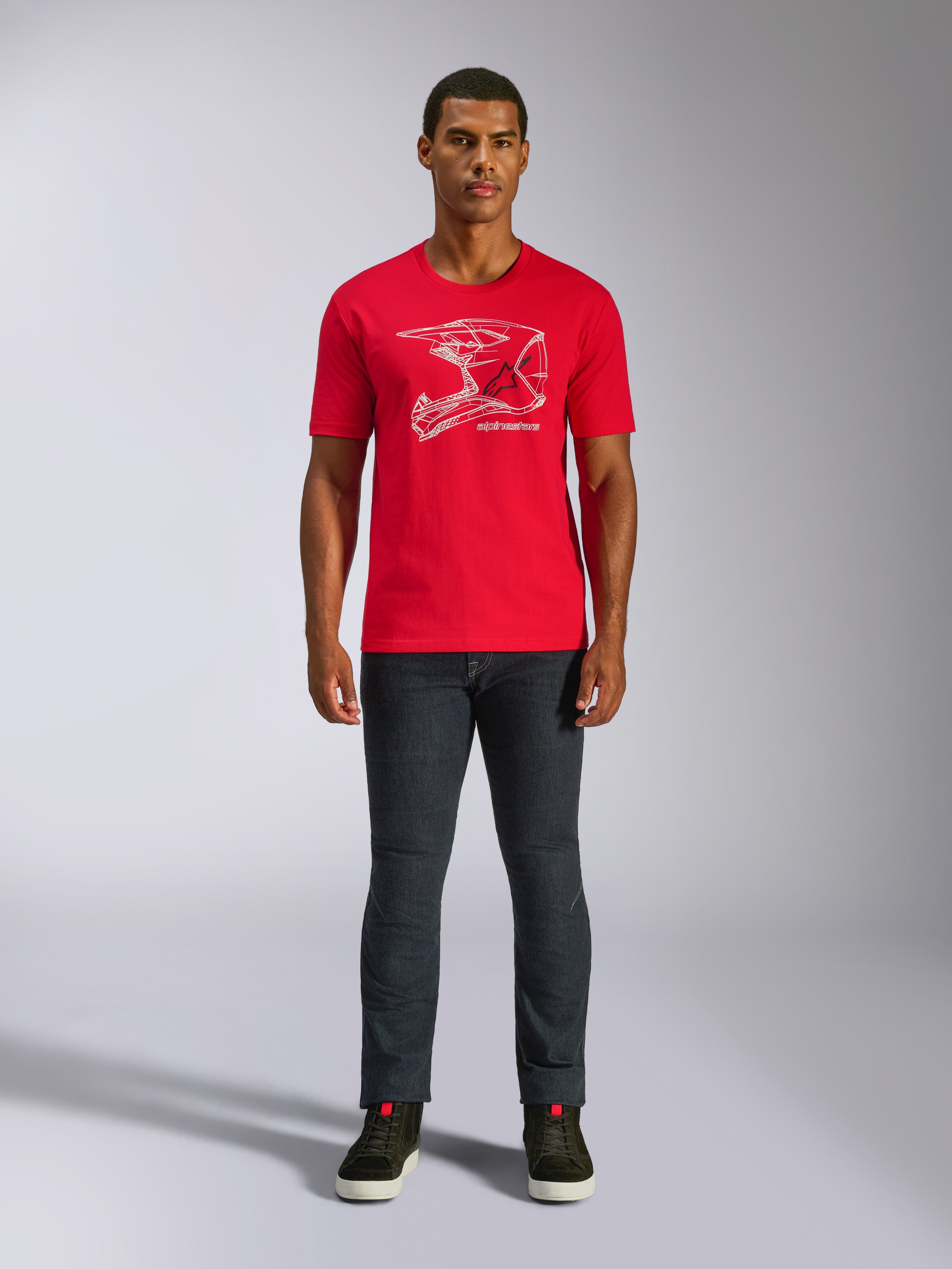 Alpinestars MX Helmet CSF Tee, Short Sleeve T-Shirt, Red, White MX Helmet Graphic, Casual Motorsport Sportswear, worn with dark jeans and sneakers