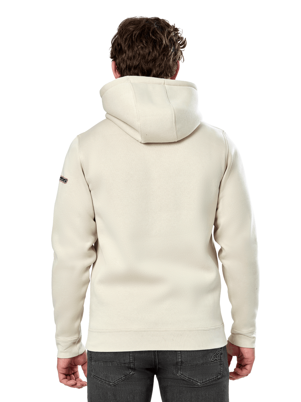 Sweat à capuche Alpinestars Insignia, vue de dos d'un homme portant un sweat décontracté en polaire, blanc cassé, doté d'une capuche doublée et de poignets côtelés, streetwear inspiré par le sport automobile