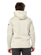 Sweat à capuche Alpinestars Insignia, vue de dos d'un homme portant un sweat décontracté en polaire, blanc cassé, doté d'une capuche doublée et de poignets côtelés, streetwear inspiré par le sport automobile