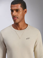 Sweatshirt Alpinestars Positive Crew, blanc cassé, pull à col rond avec petit logo étoile noir sur la poitrine, couture en V à l'encolure, vêtement lifestyle décontracté inspiré du sport automobile