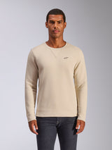 Alpinestars Positive Crew, sweat-shirt à col rond, blanc cassé, orné d'un petit logo étoile noir sur la poitrine, détail de couture en V au col, poignets et ourlet côtelés, streetwear décontracté inspiré du sport automobile