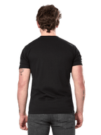 Alpinestars Semicircle CSF Tee, t-shirt à manches courtes, noir, vue de dos sur mannequin, dos uni, streetwear motorsport décontracté, porté avec un jean gris foncé