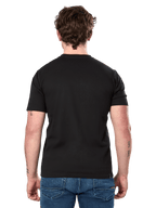 T-shirt Alpinestars Cereal CSF, manches courtes, noir, vue de dos, porté avec un jean bleu, streetwear décontracté inspiré du sport automobile