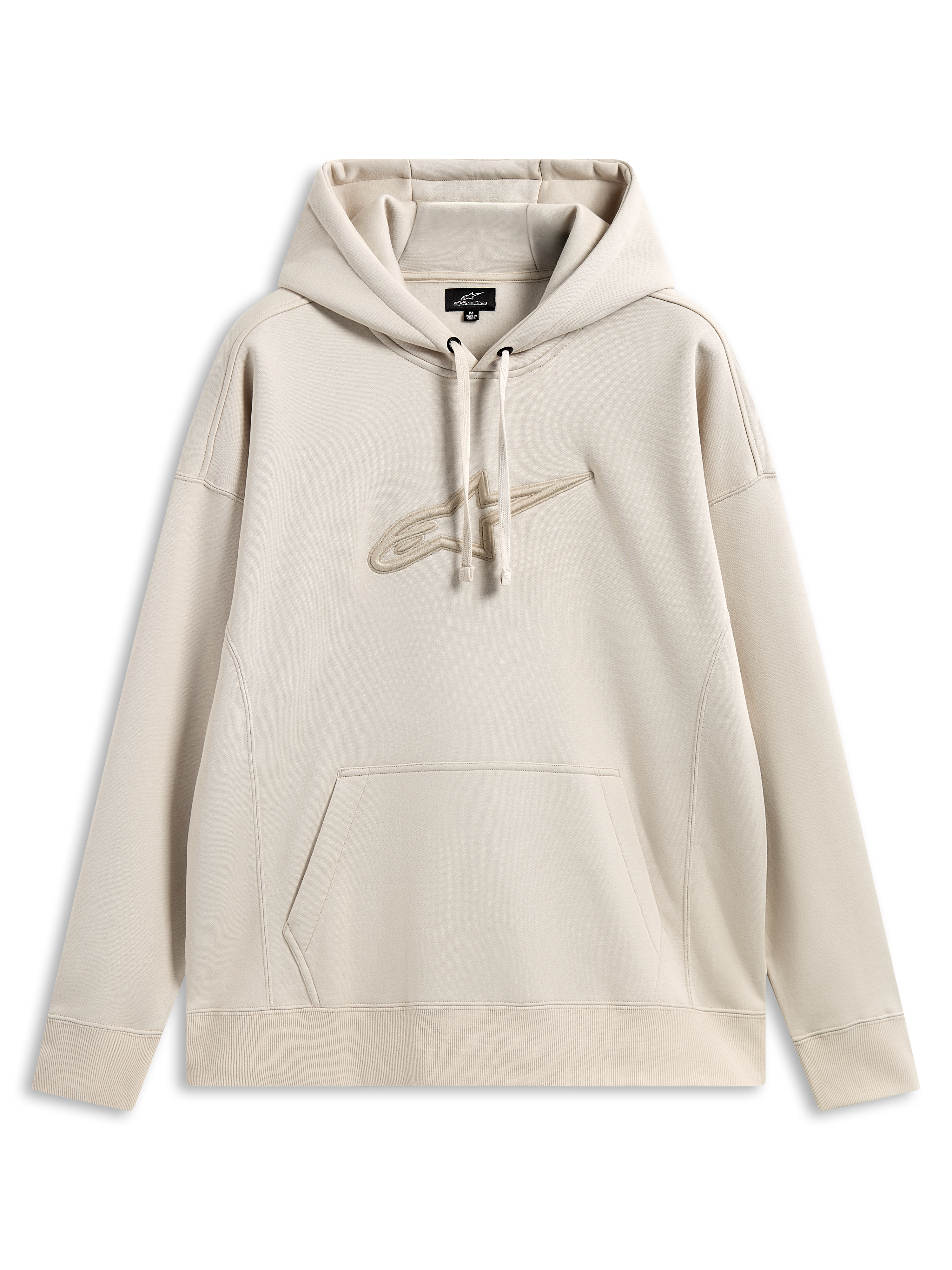 Sweat à capuche Alpinestars Emergent Oversized, streetwear motorsport décontracté, couleur sable avec logo Astars brodé en 3D ton sur ton, capuche à cordon de serrage, poche kangourou, coupe oversized décontractée