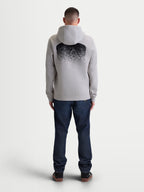 Alpinestars sweat à capuche Obsessed, sweat sportswear en polaire pour homme, gris ciment et noir, vue de dos avec un motif graphique dégradé inspiré du MX, vêtement lifestyle décontracté avec capuche et finitions en bords-côtes.