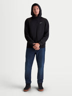 Alpinestars Sweat à capuche Cypher, sweat à capuche de sportswear pour homme, noir, fermeture éclair intégrale, col haut avec capuche doublée en mesh, petit logo Astars blanc sur la poitrine, polaire double face, porté par un modèle pour un look décontracté.