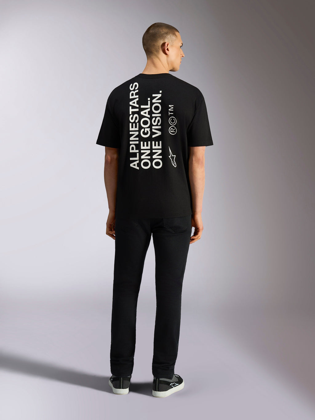 T-shirt Alpinestars One Oversized CSF, t-shirt à manches courtes, noir, impression verticale blanche au dos « ALPINESTARS ONE GOAL. ONE VISION. » avec logo Astars, style streetwear décontracté