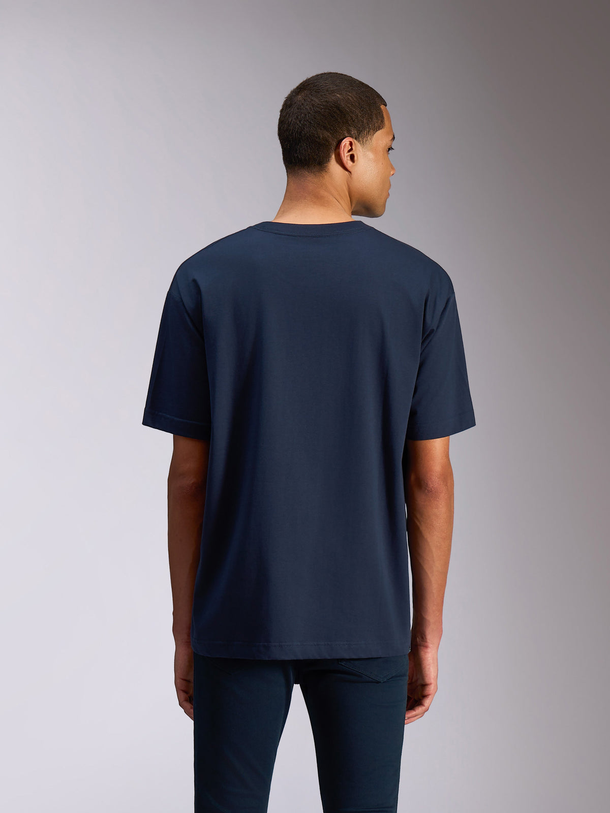 T-shirt Alpinestars Alter Oversized CSF, t-shirt à manches courtes, bleu marine, vue de dos montrant la coupe surdimensionnée décontractée et le design uni, streetwear décontracté