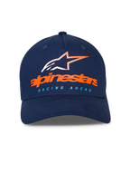 Casquette Alpinestars Instinct, casquette de baseball bleu marine, visière incurvée avec couronne structurée, logo Alpinestars orange et logo étoile rayé sur le devant, texte « RACING AHEAD » bleu clair, sportswear décontracté