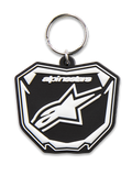 Porte-clés Plate Alpinestars, porte-clés moulé en 3D, noir et blanc, avec graphique de plaque Astars MX, logo et texte blancs, anneau à pression en métal argenté, accessoire inspiré du sport automobile