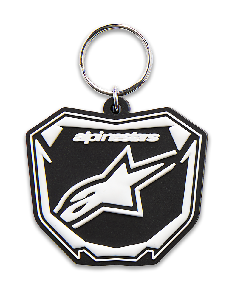 Alpinestars Plate Keyfob, 3D molded keychain, Black and White, featuring Astars MX plate graphic with white logo and text, silver metal snap ring, motorsport-inspired accessory