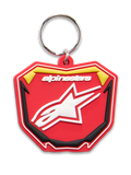 Porte-clés Alpinestars Plate, porte-clés moulé en 3D, rouge, jaune et noir, logo Alpinestars blanc et symbole d'étoile Astars, anneau à pression en métal argenté, design de plaque MX inspiré du motocross