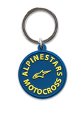 Porte-clés Alpinestars MX, bleu marine et jaune, design circulaire moulé en 3D avec texte Alpinestars Motocross et logo étoile jaunes, anneau métallique argenté, accessoire inspiré des sports mécaniques
