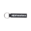 Alpinestars Linear Key Fob, Black rectangular keychain with white Alpinestars logo, silver metal ring, premium 3D molded PVC construction, motorsport-inspired accessory