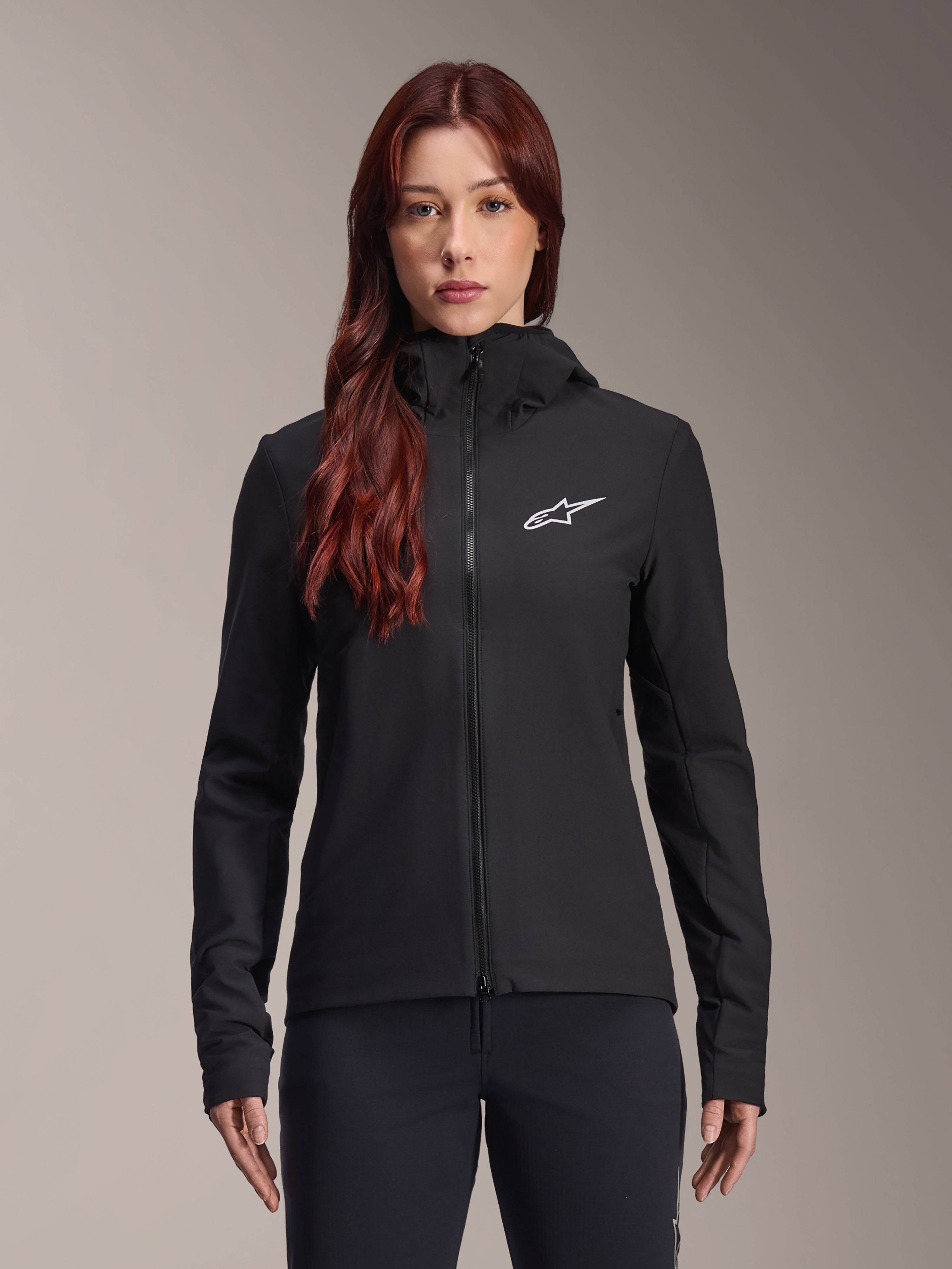 Alpinestars Stella A-Dura Thermal Jacket, veste de cyclisme pour femme, noire, logo étoile blanc sur la poitrine, design zippé à capuche, construction ajustée à manches longues pour le VTT