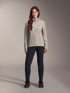 Alpinestars Woman Stella A-Dura Thermal Jacket, Mountain Bike Jacket, Titanium gray, worn with black technical pants and black footwear, featuring a fleece-lined hood and red chest logo, designed for cold-weather riding
