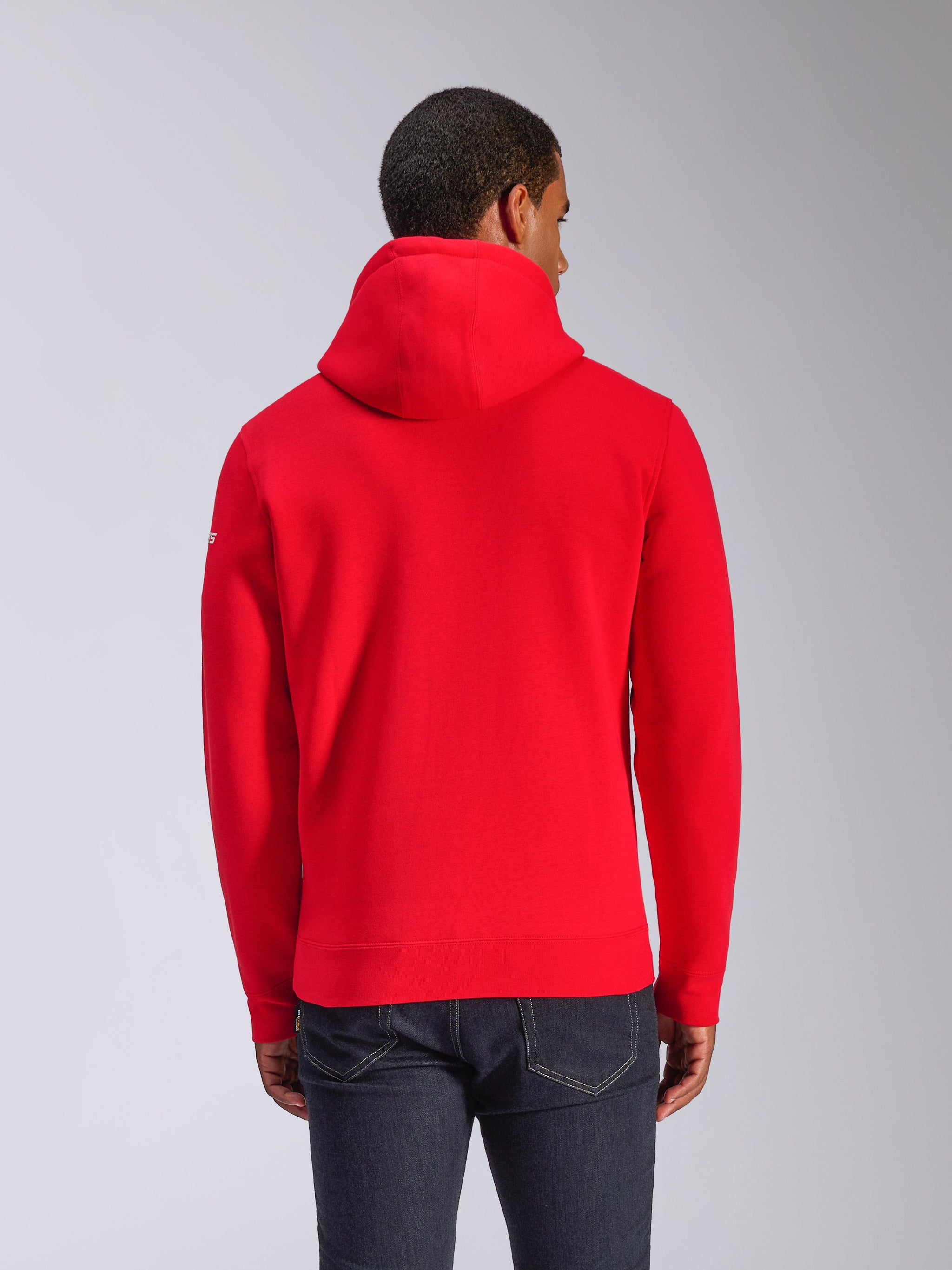 Alpinestars Frontal Hoodie, sweat à capuche en polaire, rouge, vue de dos montrant la capuche à cordon et l'ourlet côtelé, petit logo blanc sur la manche, streetwear décontracté inspiré du sport automobile