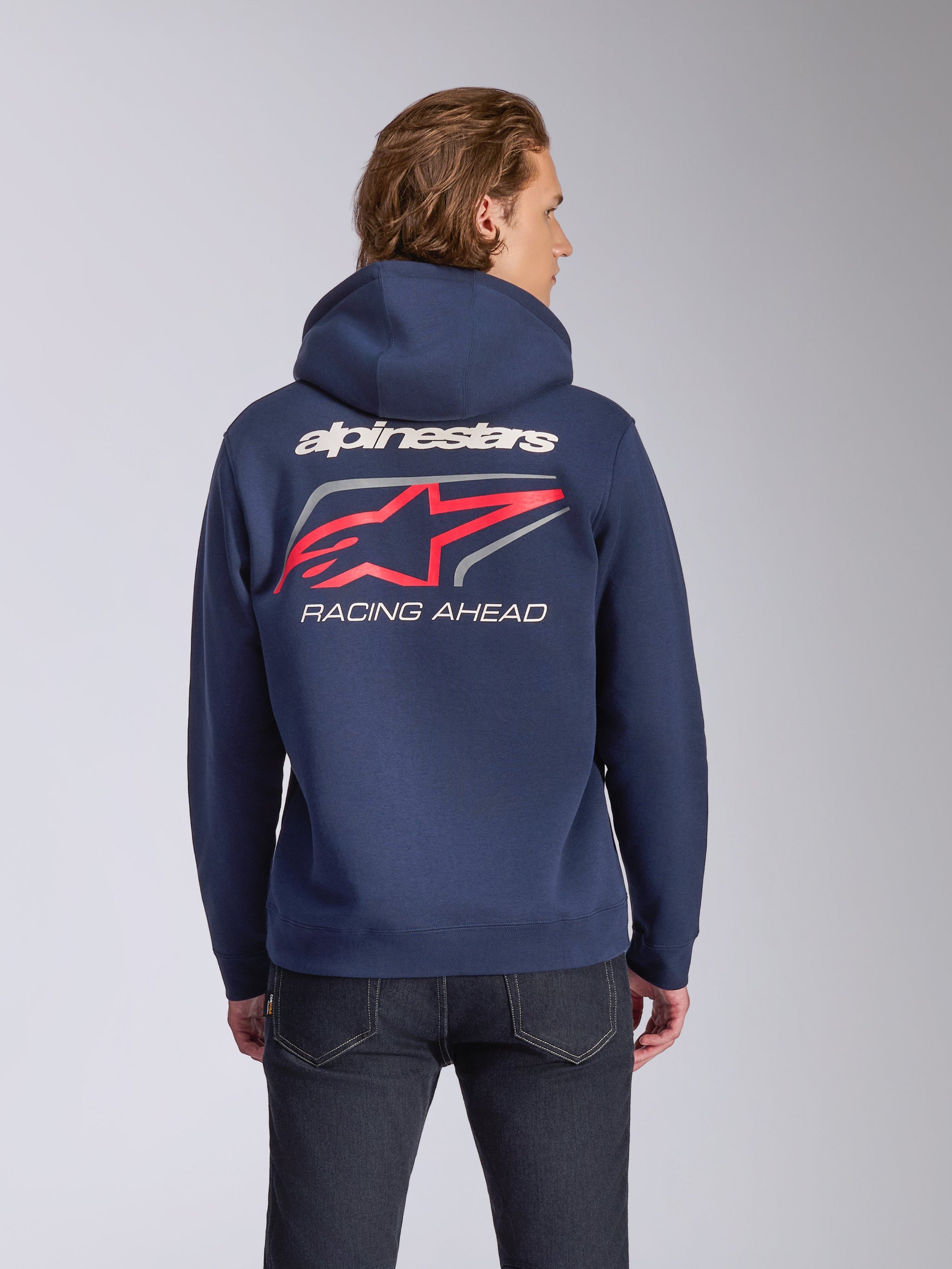 Alpinestars Formulation Hoodie, Navy Blue, back view featuring white Alpinestars branding, large red A-stars logo with grey accents, and 'RACING AHEAD' text, casual motorsport streetwear
