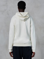 Sweat à capuche zippé Alpinestars Essentials Ageless, vue de dos, blanc cassé, style streetwear décontracté, polaire compacte de qualité supérieure, coupe décontractée, poignets et ourlet côtelés, design minimaliste épuré