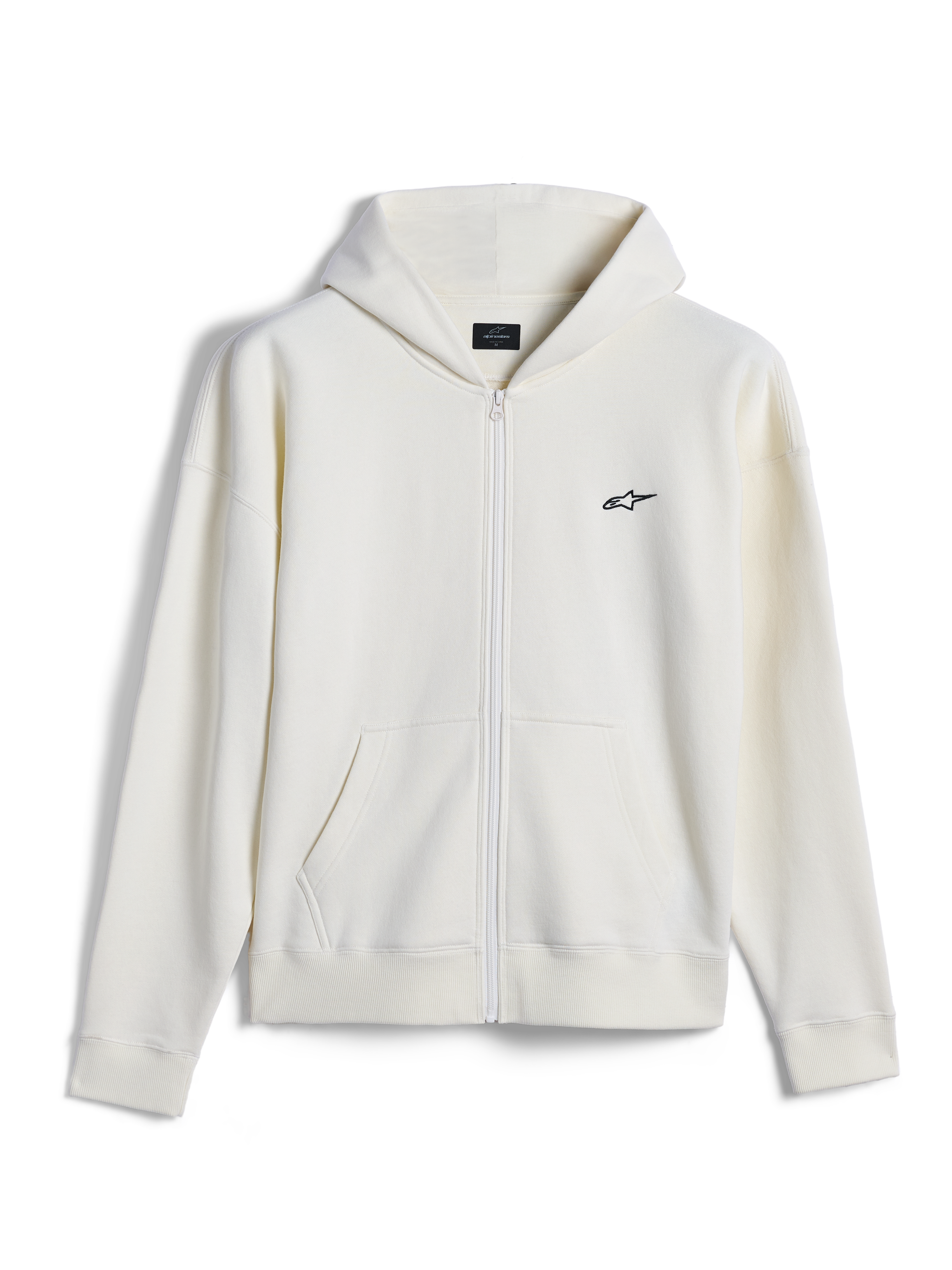 Sweat à capuche zippé Alpinestars Essentials Ageless, streetwear décontracté, blanc cassé avec petit logo Alpinestars noir, fermeture éclair intégrale, poche kangourou fendue, coupe décontractée, conception en polaire compacte premium