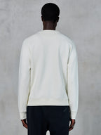 Alpinestars Essentials Ageless Crew, sweat-shirt à col rond blanc cassé, vue de dos, sportswear décontracté, avec poignets et ourlet côtelés, design épuré avec coupe décontractée, polaire douce de qualité supérieure