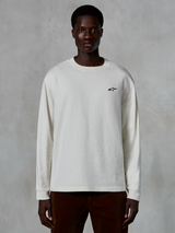 Alpinestars Essentials Ageless LS Tee, Long Sleeve T-Shirt, Off White, small black star logo on the chest, casual streetwear, relaxed fit, worn by a model