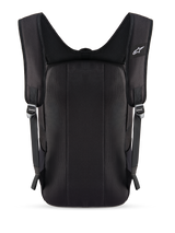 Alpinestars Defcon V3 Backpack, Black, rear view showing padded back panel and breathable air mesh shoulder straps, small white Alpinestars logo on the strap, durable 600D polyester construction for daily use.