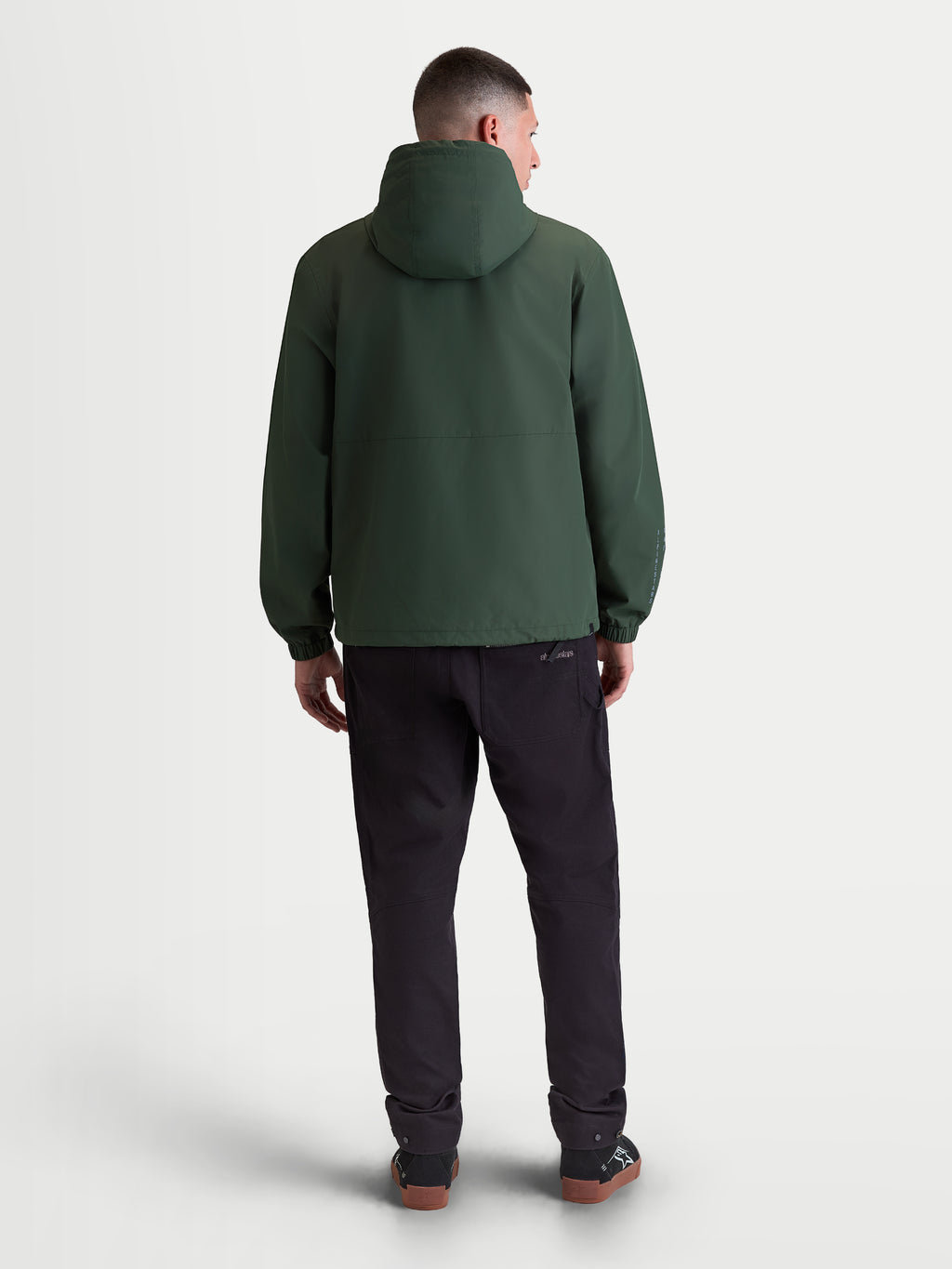 Alpinestars Speeder Resolve Windbreaker Jacket, Men's Lightweight Sportswear Hooded Shell in Pine Green, Windproof Textile Design, Back View showing hood and elastic cuffs.